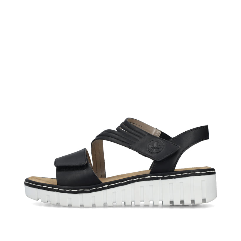 Schwarze Rieker Keilsandaletten V1364-00 mit einem Klettverschluss. Schuh Außenseite.