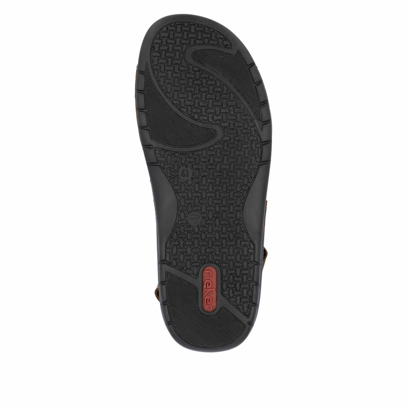 Mules Rieker marron homme 25559-25 en cuir velours avec fermeture velcro. Semelle extérieure de la chaussure.