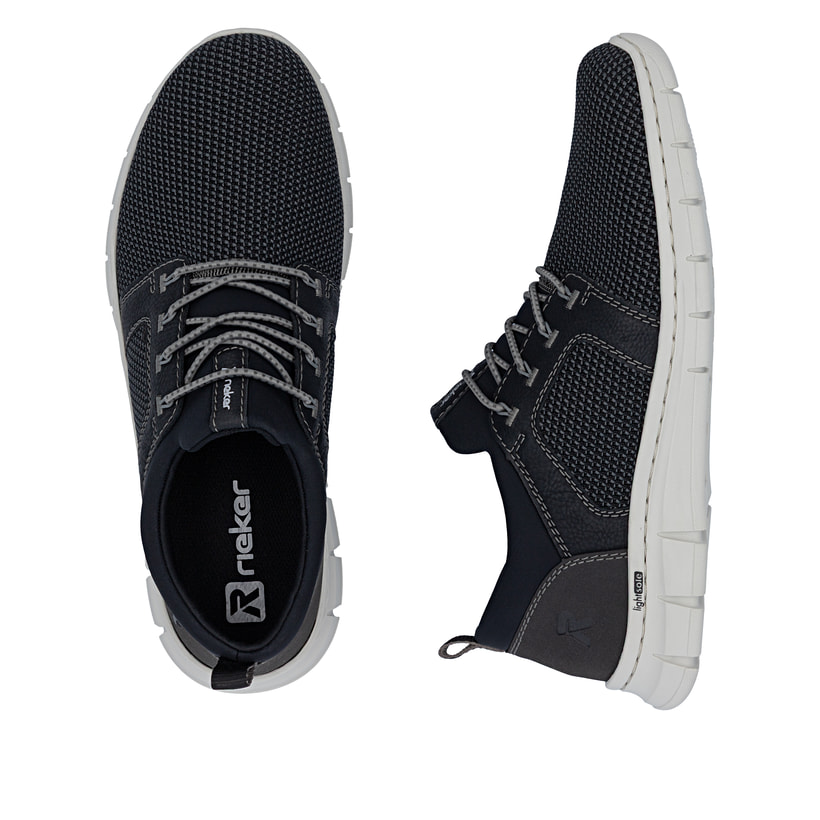 Mocassins Rieker noirs pour homme B7796-02 avec bande élastique. Chaussure vue de dessus, couchée.