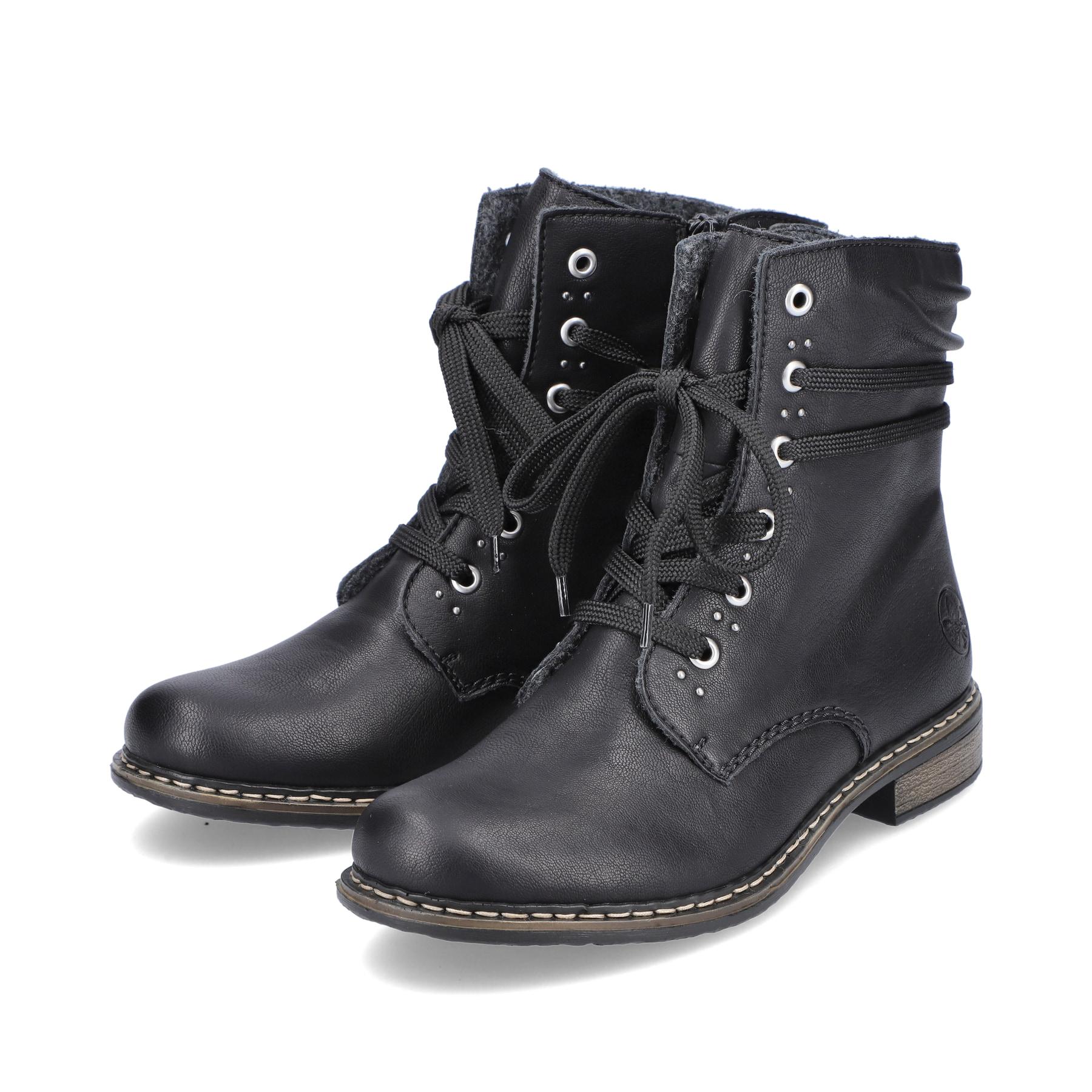 Bottes à lacets Rieker noires pour femme 71218-00 avec fermeture éclair. Chaussures inclinées sur le côté.