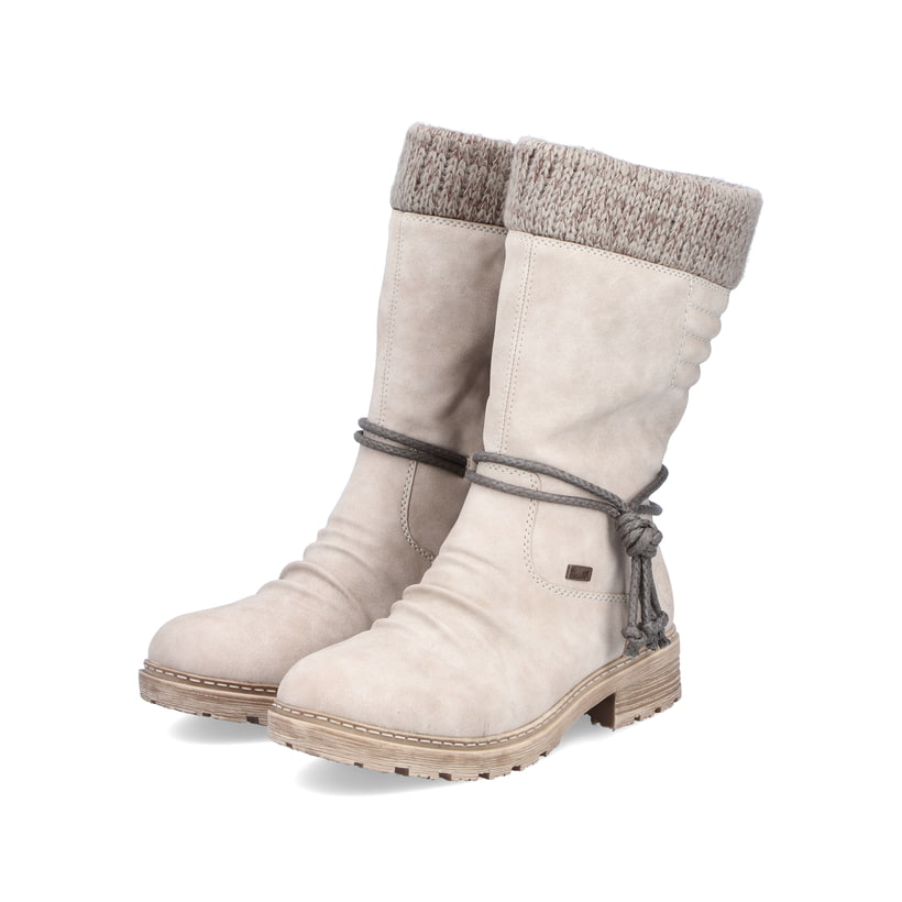 Beige Rieker Damen Kurzstiefel Z4755-60 mit wasserabweisender RiekerTEX-Membran. Schuhpaar seitlich schräg.