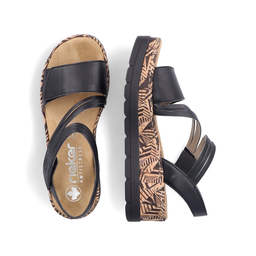 Schwarze Rieker Keilsandaletten V3964-02 mit stilvollem Muster. Schuh von oben, liegend.