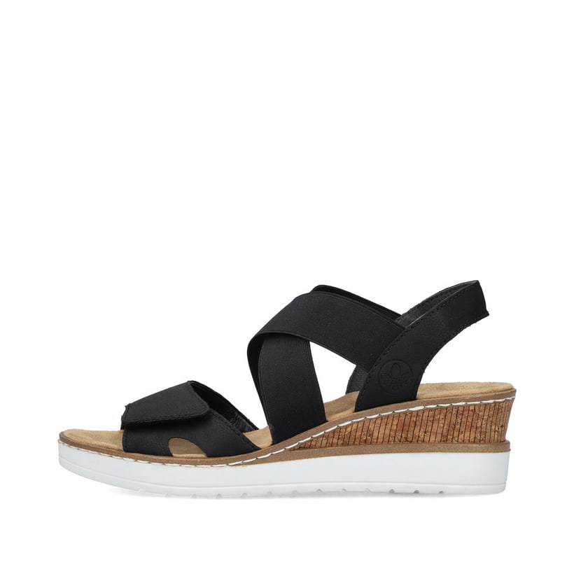 Schwarze Rieker Keilsandaletten V38G8-00 mit Elastikeinsatz sowie leichter Sohle. Schuh Außenseite.