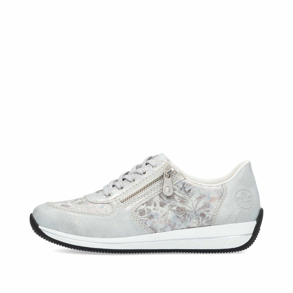 Baskets basses Rieker blanches pour femme N1112-80 avec motif floral. Côté extérieur de la chaussure.