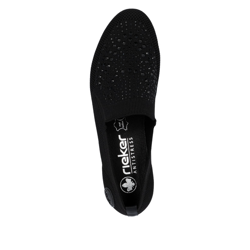 Schwarze Rieker Damen Slipper 51989-00 mit Strasssteinen sowie einem Gummizug. Schuh von oben.