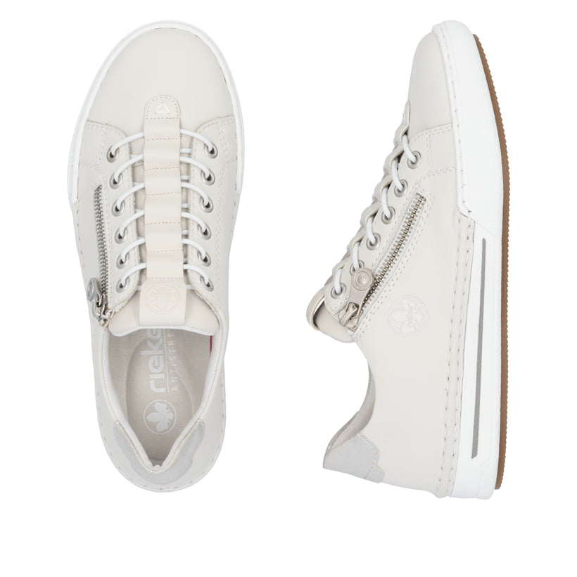 Weiße Rieker Damen Slipper L7250-80 mit einem Reißverschluss. Schuh von oben, liegend.