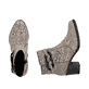 Beige-schwarze Rieker Damen Stiefeletten Y2066-64 mit Deko-Kette. Schuh von oben, liegend.