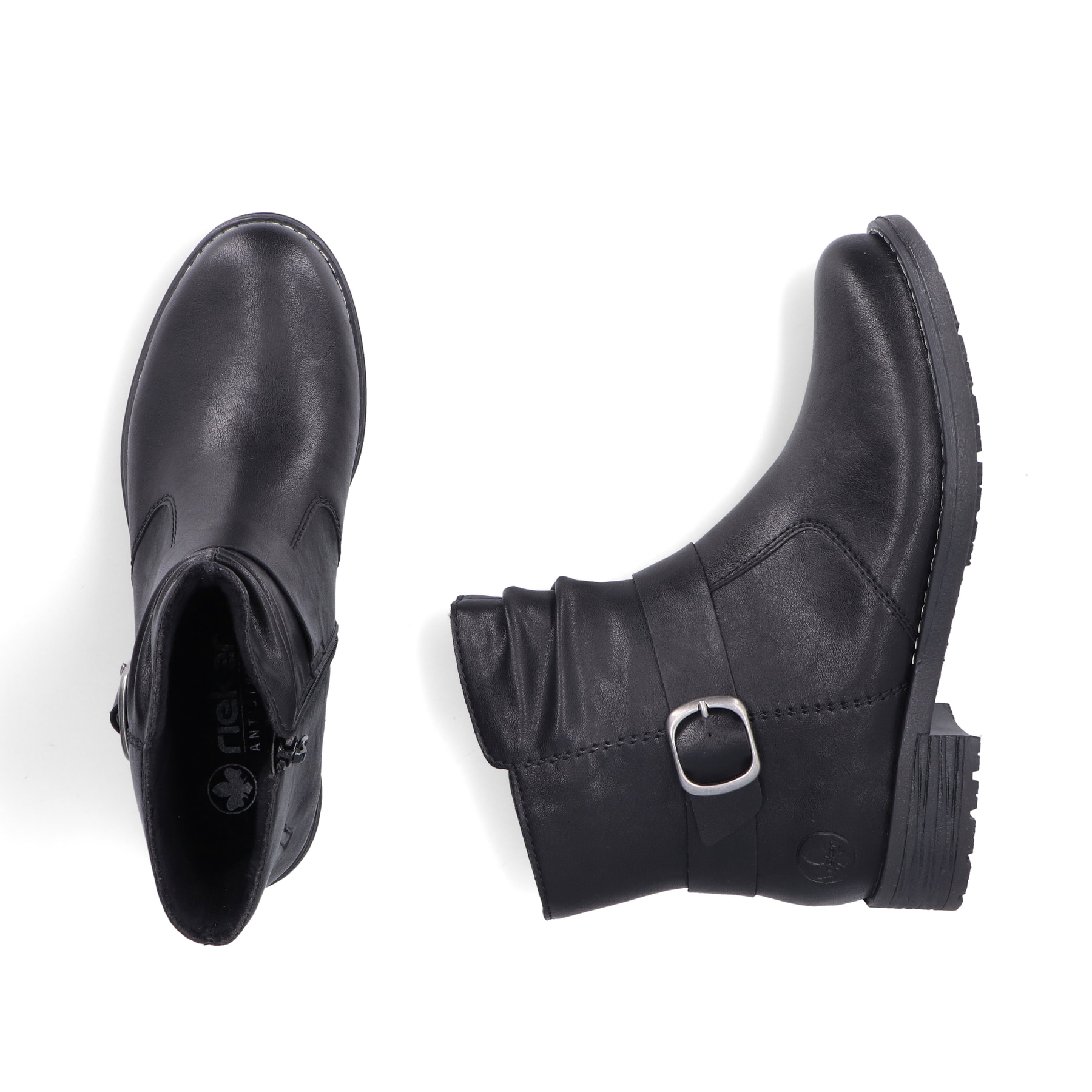 Schwarze Rieker Damen Biker Boots 79462-00 mit dekorativer Schnalle. Schuh von oben, liegend.
