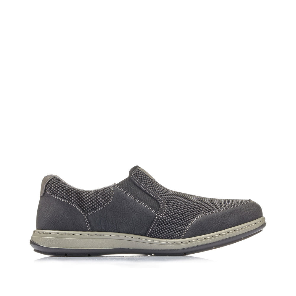 Schwarze Rieker Herren Slipper 17363-00 mit einem Gummizug sowie Extraweite H. Schuh Innenseite.