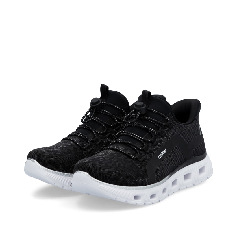 Baskets basses Rieker noires femme M6066-01 avec option easy in facile. Chaussures inclinées sur le côté.