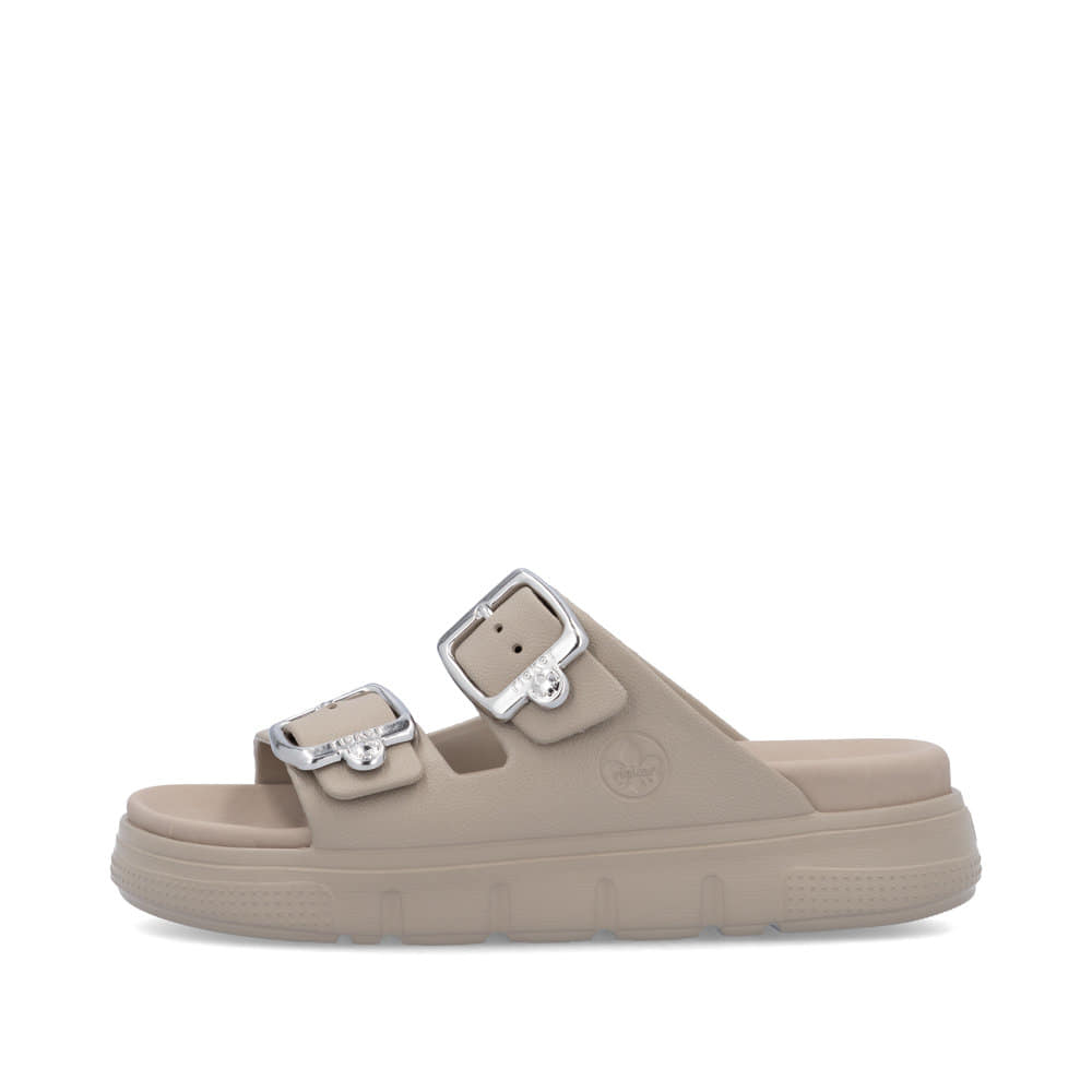 Beige Rieker Damen Pantoletten P2180-60 mit Schnallen sowie ultraleichter Sohle. Schuh Außenseite.