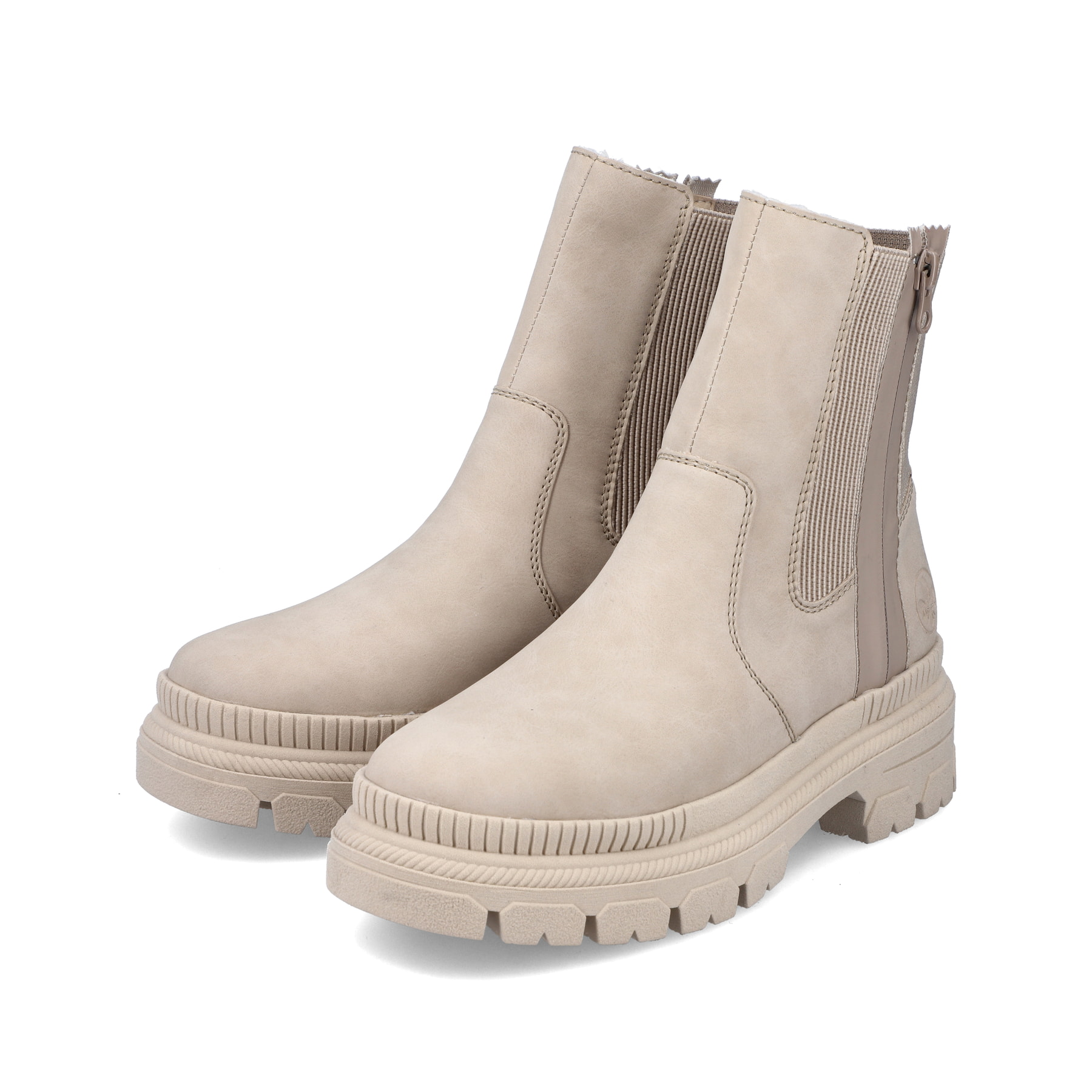 Cremebeige Rieker Damen Chelsea Boots Y9373-62 mit einem Reißverschluss. Schuhpaar seitlich schräg.