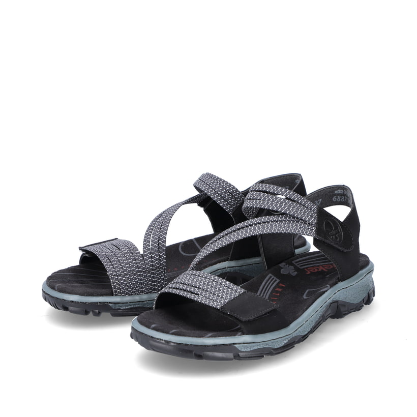 Schwarze Rieker Damen Trekkingsandalen 68871-00 mit einem Klettverschluss. Schuhpaar seitlich schräg.