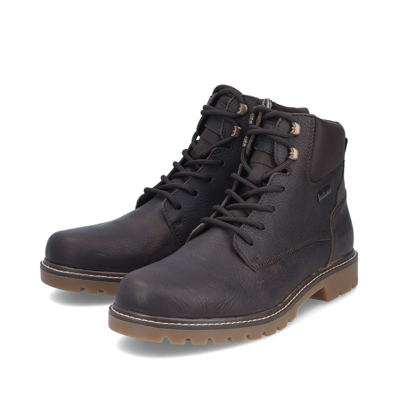 Braune Rieker Herren Schnürstiefel 39821-24 aus Glattleder. Schuhpaar seitlich schräg.