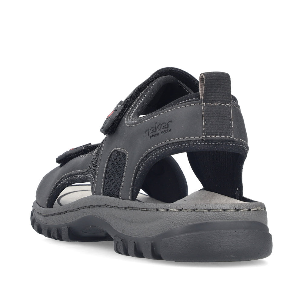 Schwarze Rieker Herren Trekkingsandalen 25055-00 mit einem Klettverschluss. Schuh von hinten.