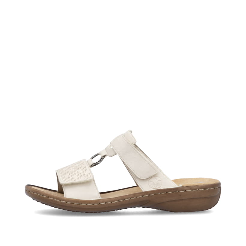 Beige Rieker Damen Pantoletten 60885-62 in Löcheroptik mit einem Klettverschluss. Schuh Außenseite.