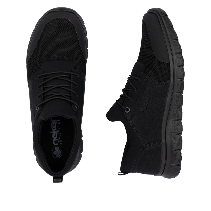 Schwarze Rieker Herren Slipper B6650-00 mit Gummizug sowie Komfortweite G 1/2. Schuh von oben, liegend.