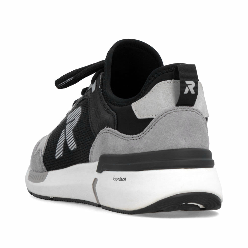 Mocassins Rieker noirs pour homme U1405-00 avec bande élastique. Chaussure vue de l'arrière.
