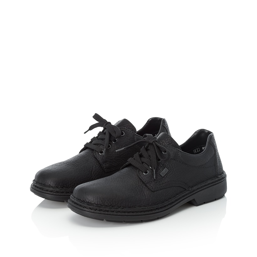 Schwarze Rieker Herren Schnürschuhe 05001-00 mit wasserabweisender TEX-Membran. Schuhpaar seitlich schräg.