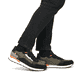 Grüne Rieker Herren Sneaker Low U0308-54 mit wasserabweisender Nano-Beschichtung. Schuh am Fuß.
