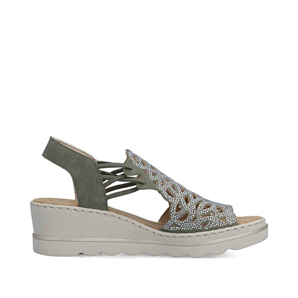 Khakifarbene Rieker Keilsandaletten 67465-52 mit Strasssteinen sowie Gummizug. Schuh Innenseite.
