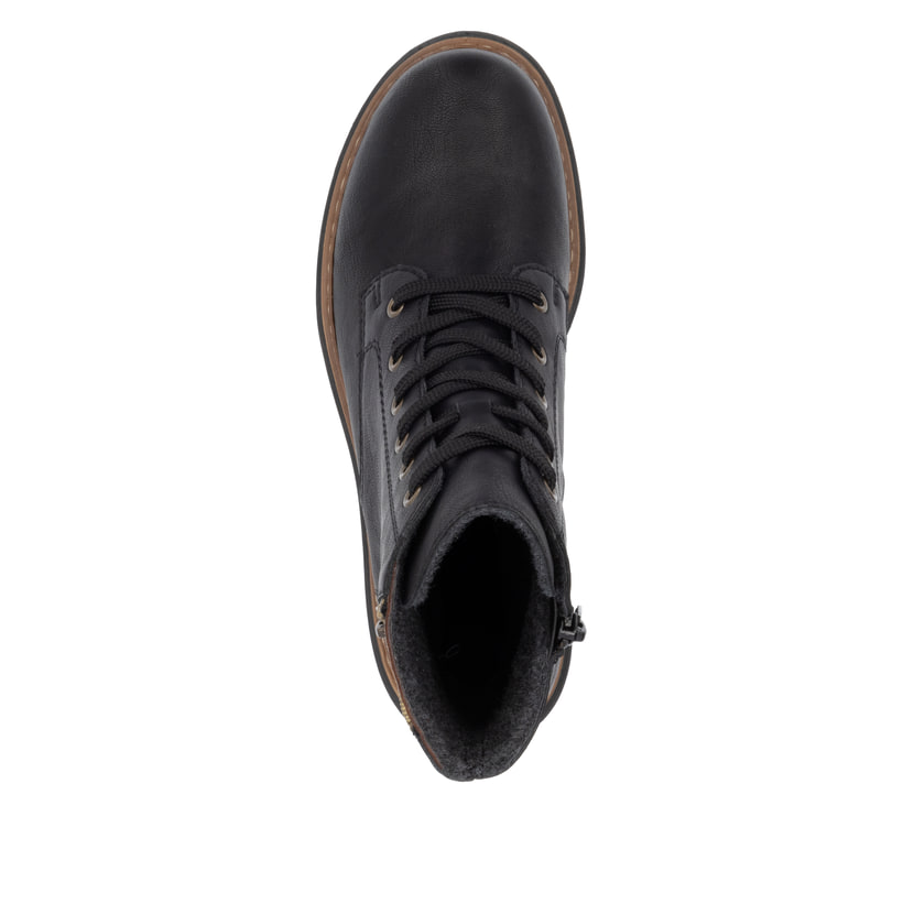 Biker Boots Rieker noires pour femme 72617-00 avec imprimé léopard. Semelle extérieure de la chaussure.