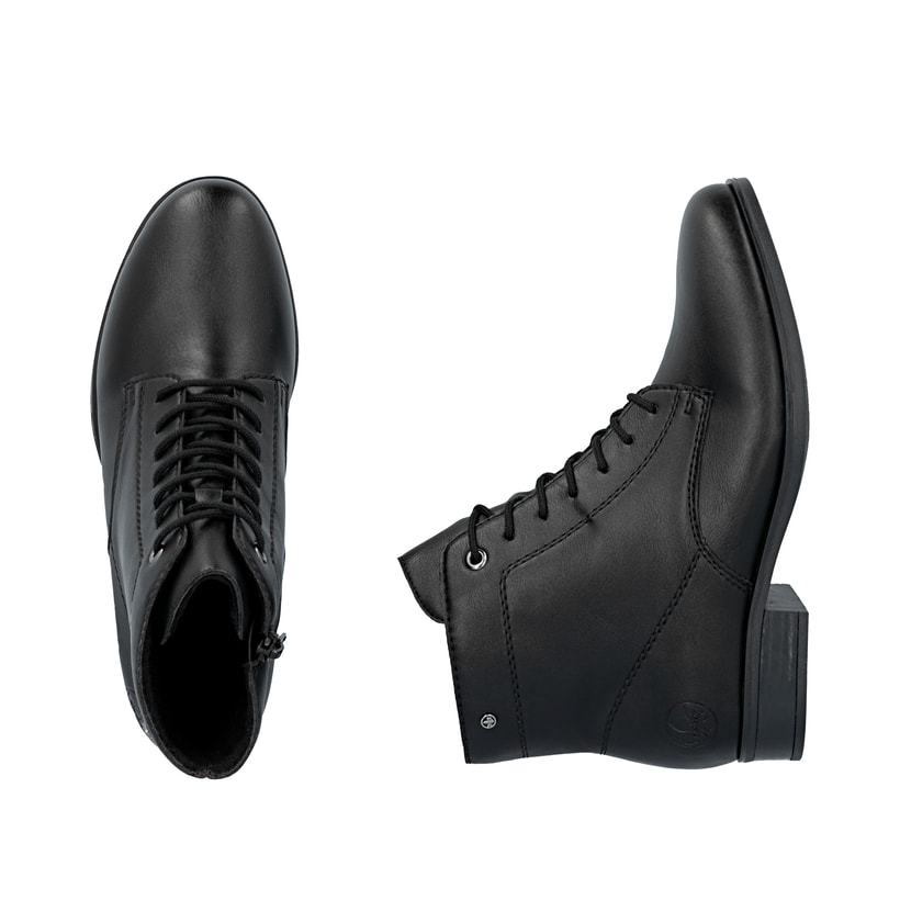 Schwarze Rieker Damen Schnürstiefel 77030-00 mit einem Reißverschluss. Schuh von oben, liegend.