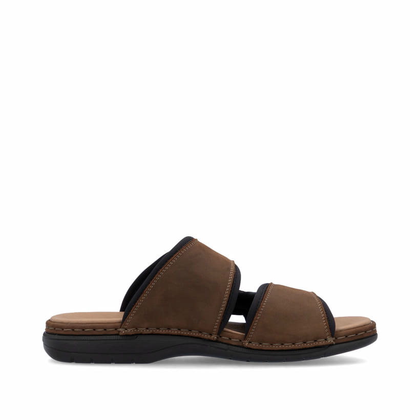 Mules Rieker marron homme 25559-25 en cuir velours avec fermeture velcro. Côté intérieur de la chaussure.