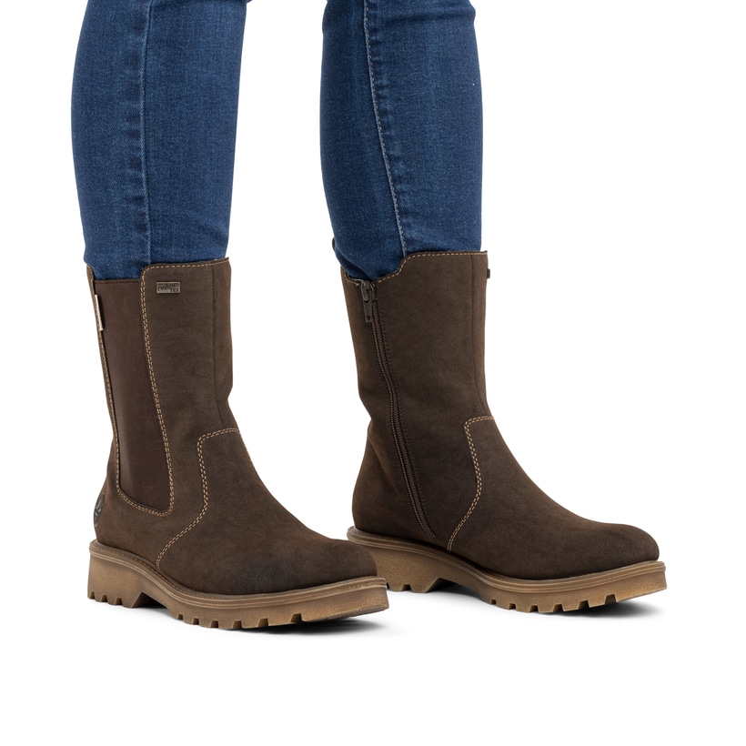 Dunkelbraune Rieker Damen Chelsea Boots 73260-25 mit einem Reißverschluss. Schuh am Fuß.