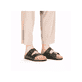 Grüne Rieker Herren Pantoletten 22190-54 mit einem Schnallen sowie Extraweite H. Schuh am Fuß.