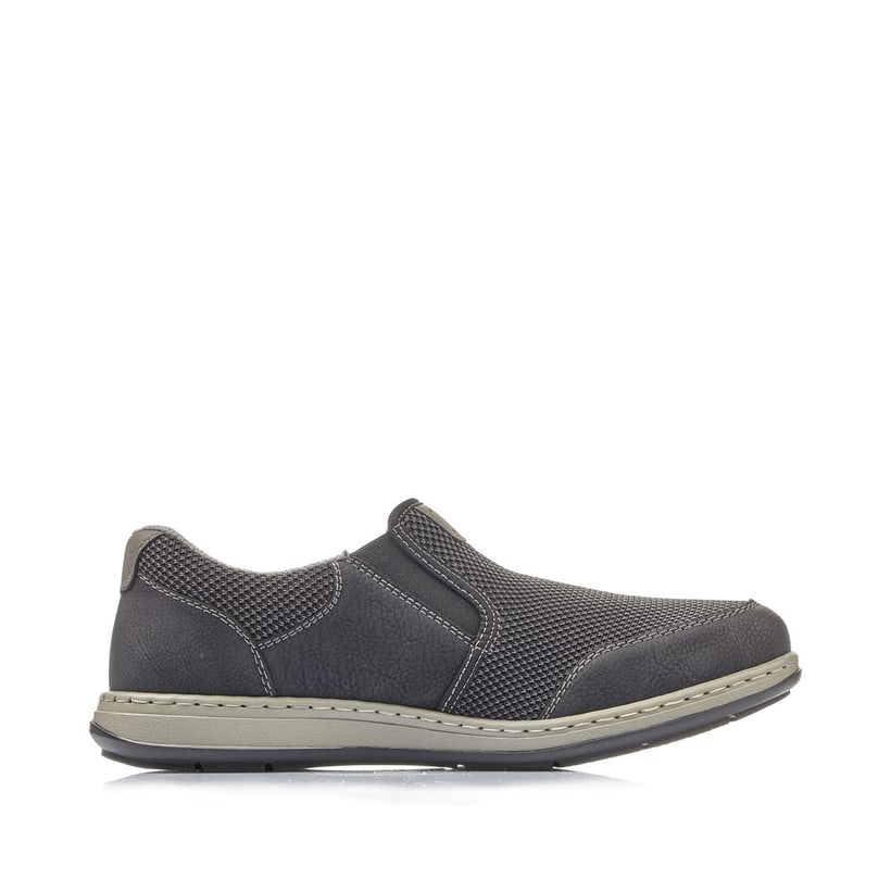 Schwarze Rieker Herren Slipper 17363-00 mit einem Gummizug sowie Extraweite H. Schuh Innenseite.