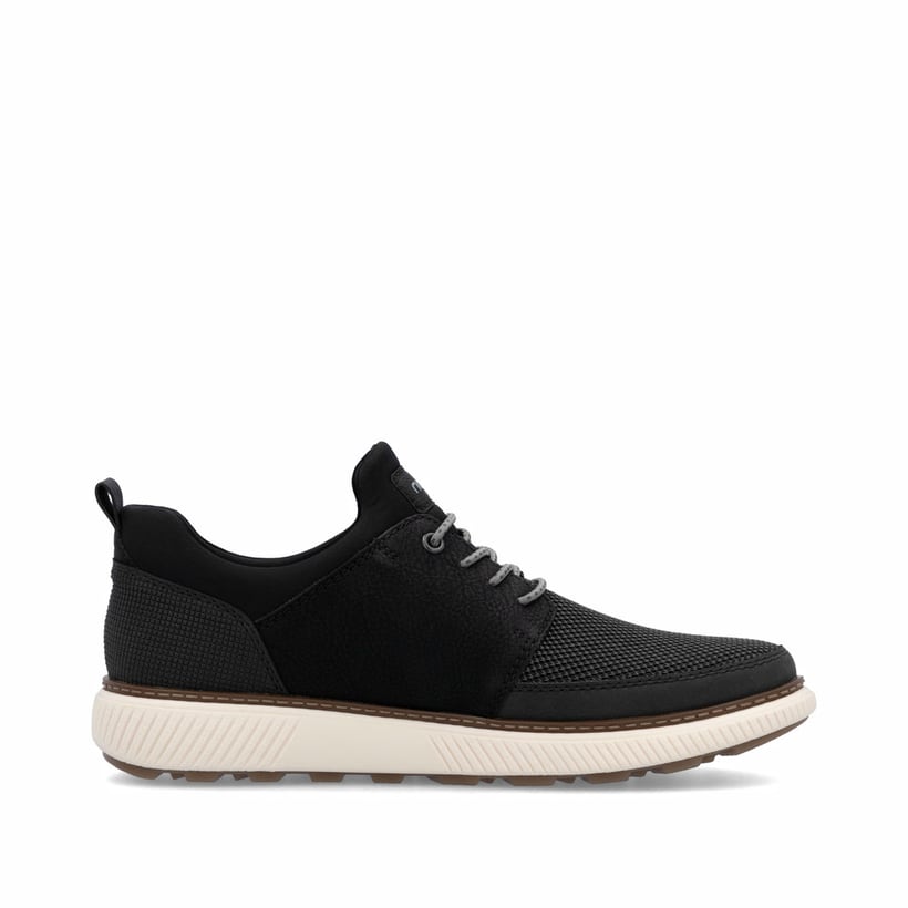 Schwarze Rieker Herren Slipper B3354-00 mit einem Gummizug sowie Extraweite H. Schuh Innenseite.
