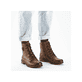 Braune Rieker Damen Schnürstiefel 71202-24 mit Zierschnalle sowie Reißverschluss. Schuh am Fuß.