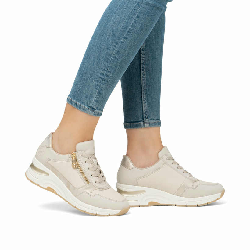 Baskets basses Rieker beiges pour femme N9301-60 avec fermeture éclair. Chaussure au pied.