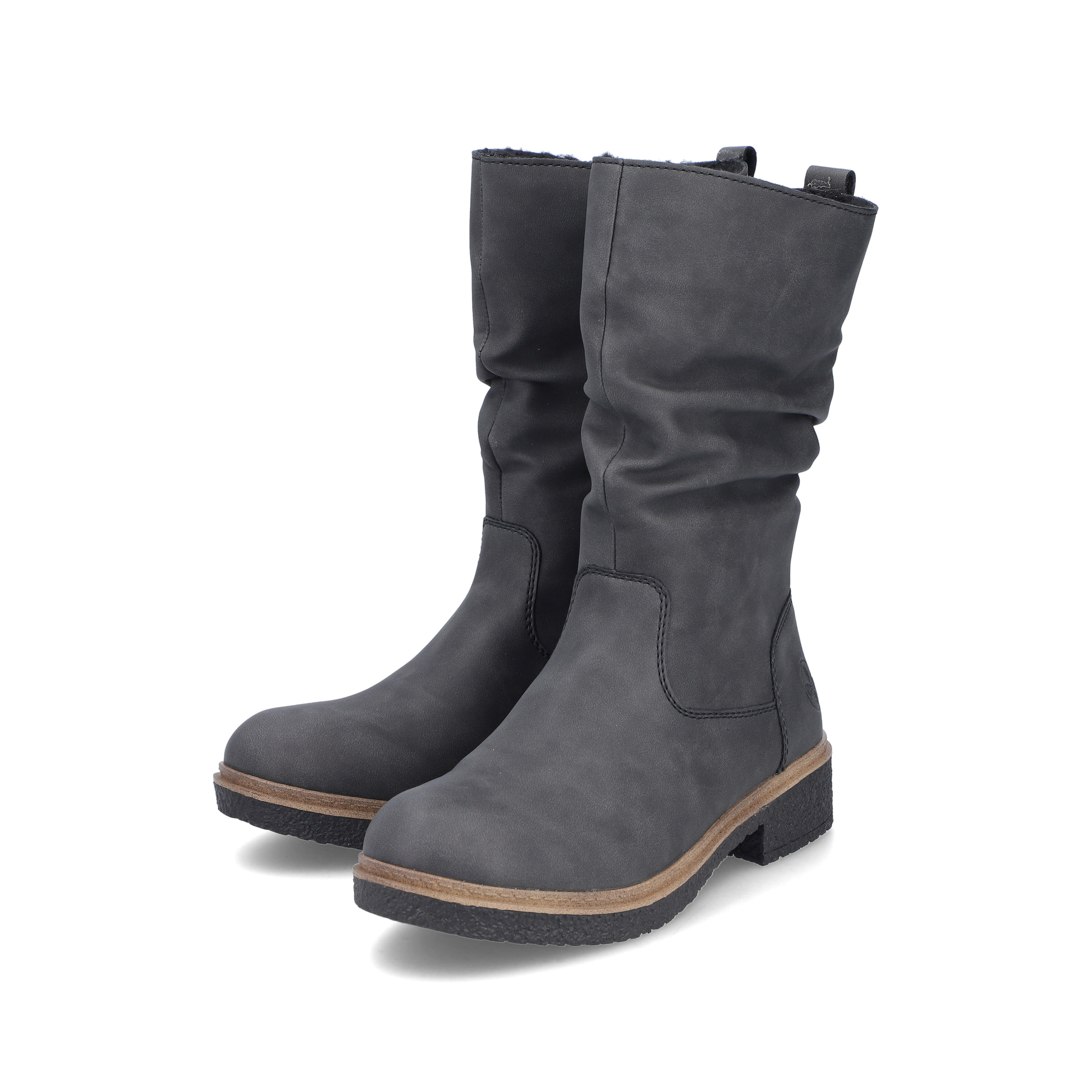 
Sandbeige Rieker Damen Chelsea Boots Z4994-60 mit einer schockabsorbierenden Sohle. Schuh seitlich schräg