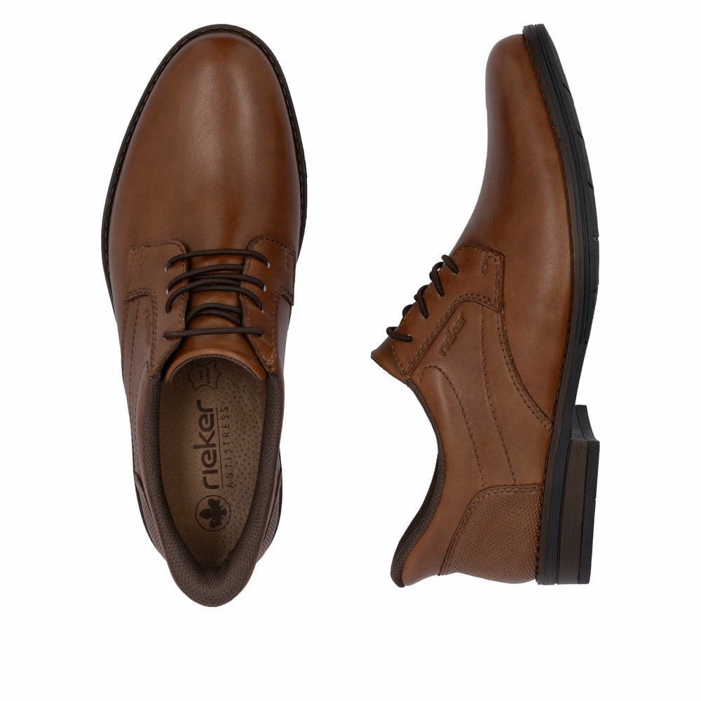 Braune Rieker Herren Slipper 10353-24 mit easy Hineinschlüpf-Möglichkeit. Schuh von oben, liegend.