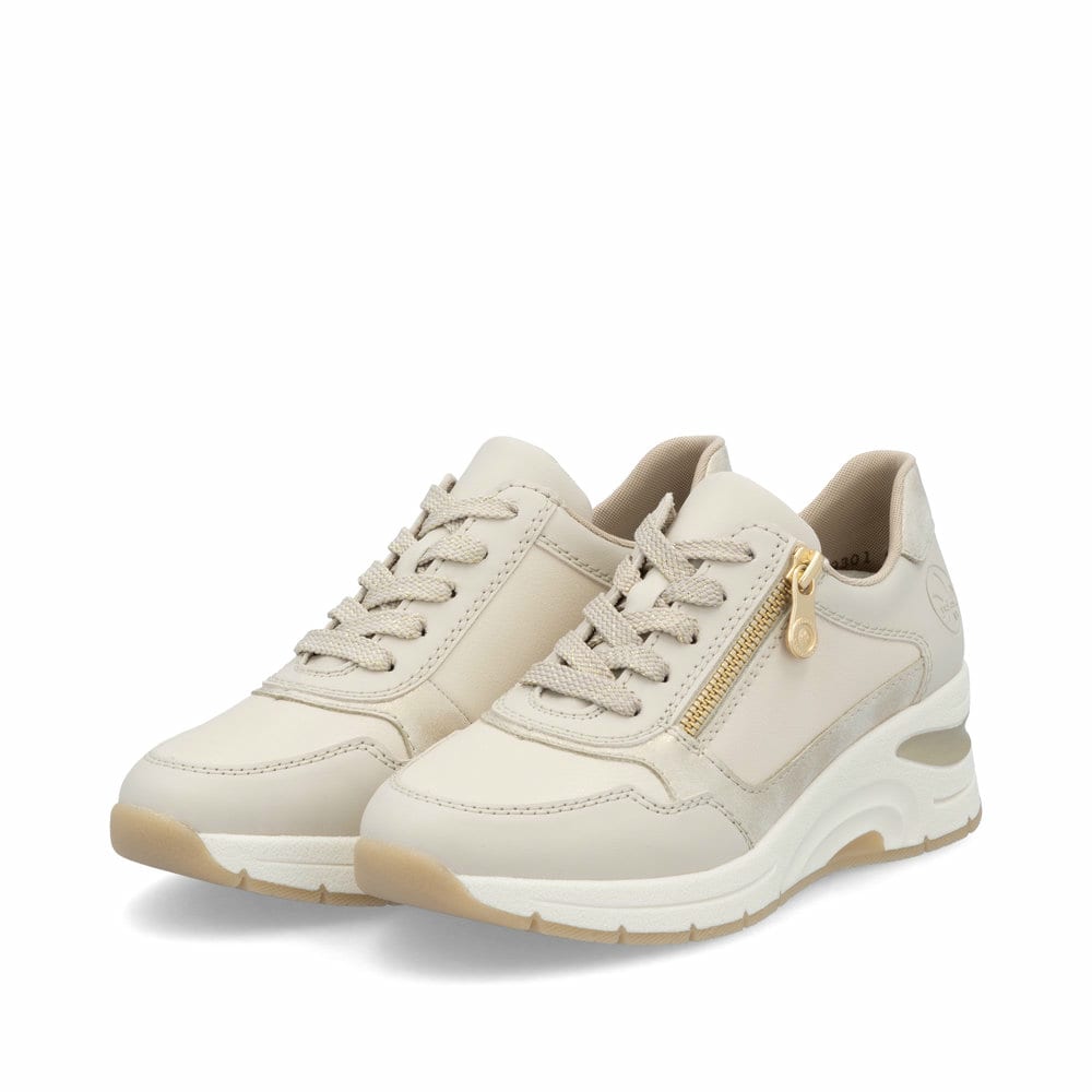 Baskets basses Rieker beiges pour femme N9301-60 avec fermeture éclair. Chaussures inclinées sur le côté.