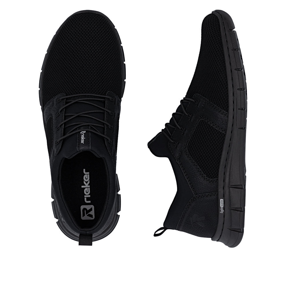 Mocassins Rieker noirs pour homme B7796-01 avec bande élastique. Chaussure vue de dessus, couchée.