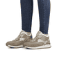 Beige Rieker Damen Sneaker High W0660-64 mit einer leichten und griffigen Sohle. Schuh am Fuß.