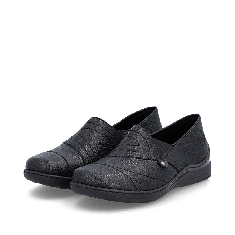 Mocassins Rieker noirs pour femmes 48961-02 avec bande élastique. Chaussures inclinées sur le côté.