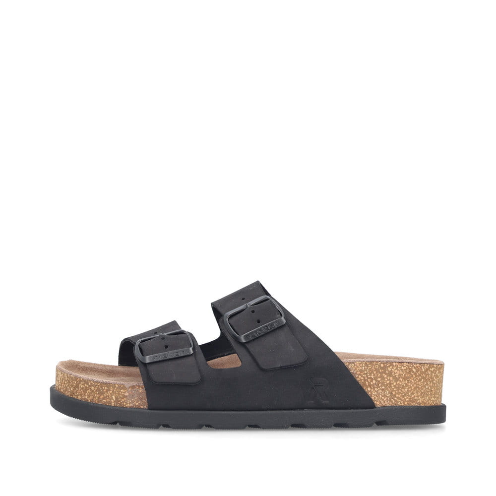 Mules Rieker noires pour femme V3190-01 en cuir velours avec boucles. Côté extérieur de la chaussure.