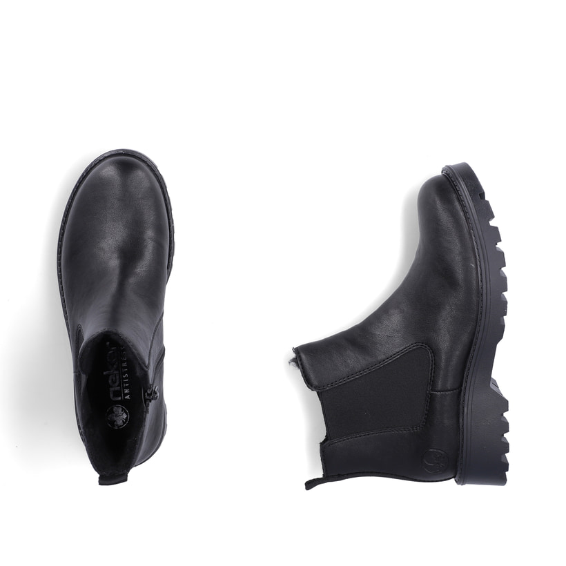 Schwarze Rieker Damen Chelsea Boots 73250-01 mit einem Reißverschluss. Schuh von oben, liegend.
