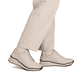 Beige Rieker Damen Sneaker Low M4903-61 aus Glattleder mit einer Schnürung. Schuh am Fuß.
