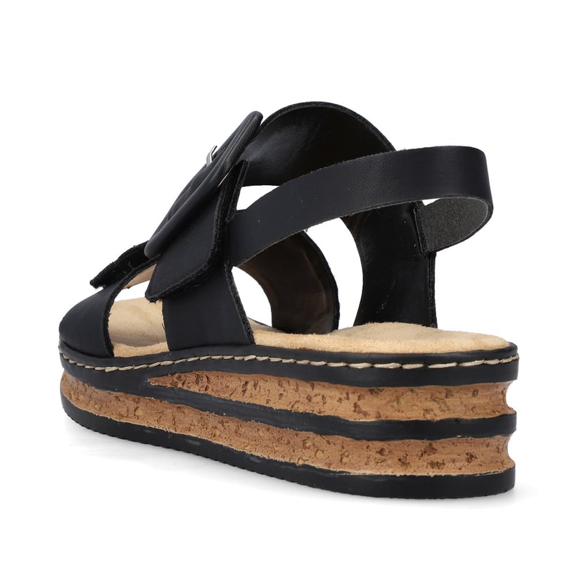 Schwarze Rieker Keilsandaletten 62950-00 mit trendigen Schnalle. Schuh von hinten.