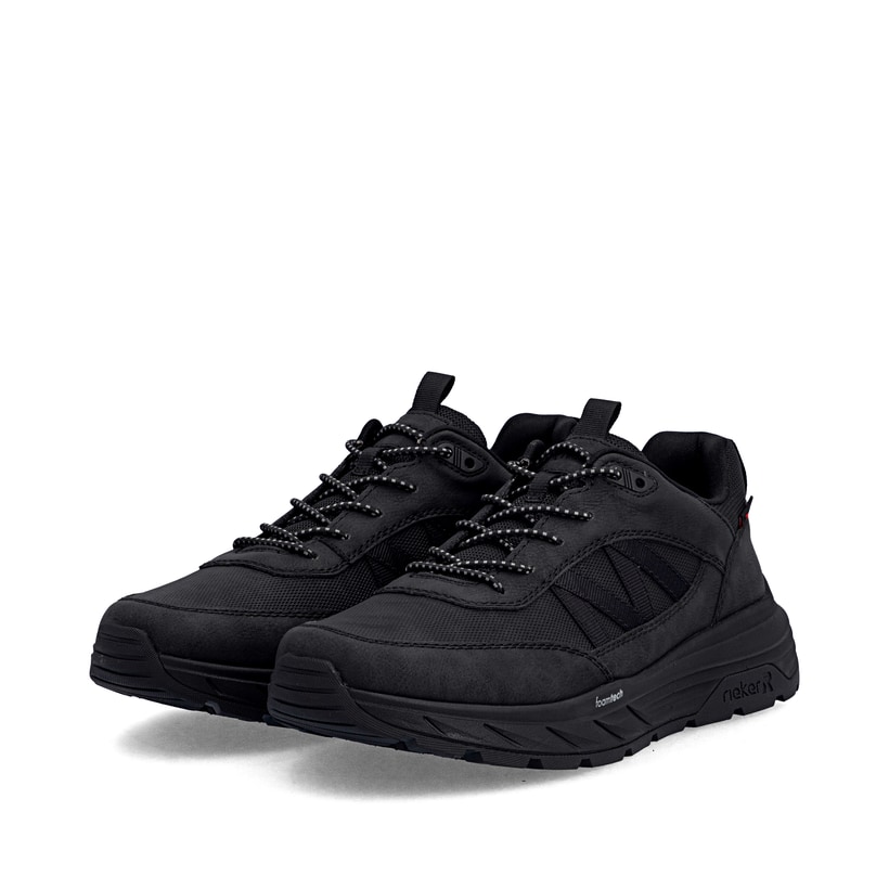 Mocassins Rieker noirs hommes 06155-00 avec membrane RiekerTEX hydrofuge. Chaussures inclinées sur le côté.