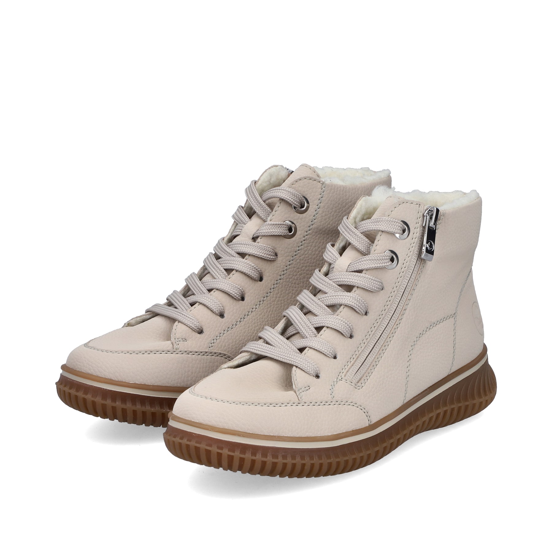Hellbeige Rieker Damen Schnürstiefel 74234-60 mit einem Reißverschluss. Schuhpaar seitlich schräg.