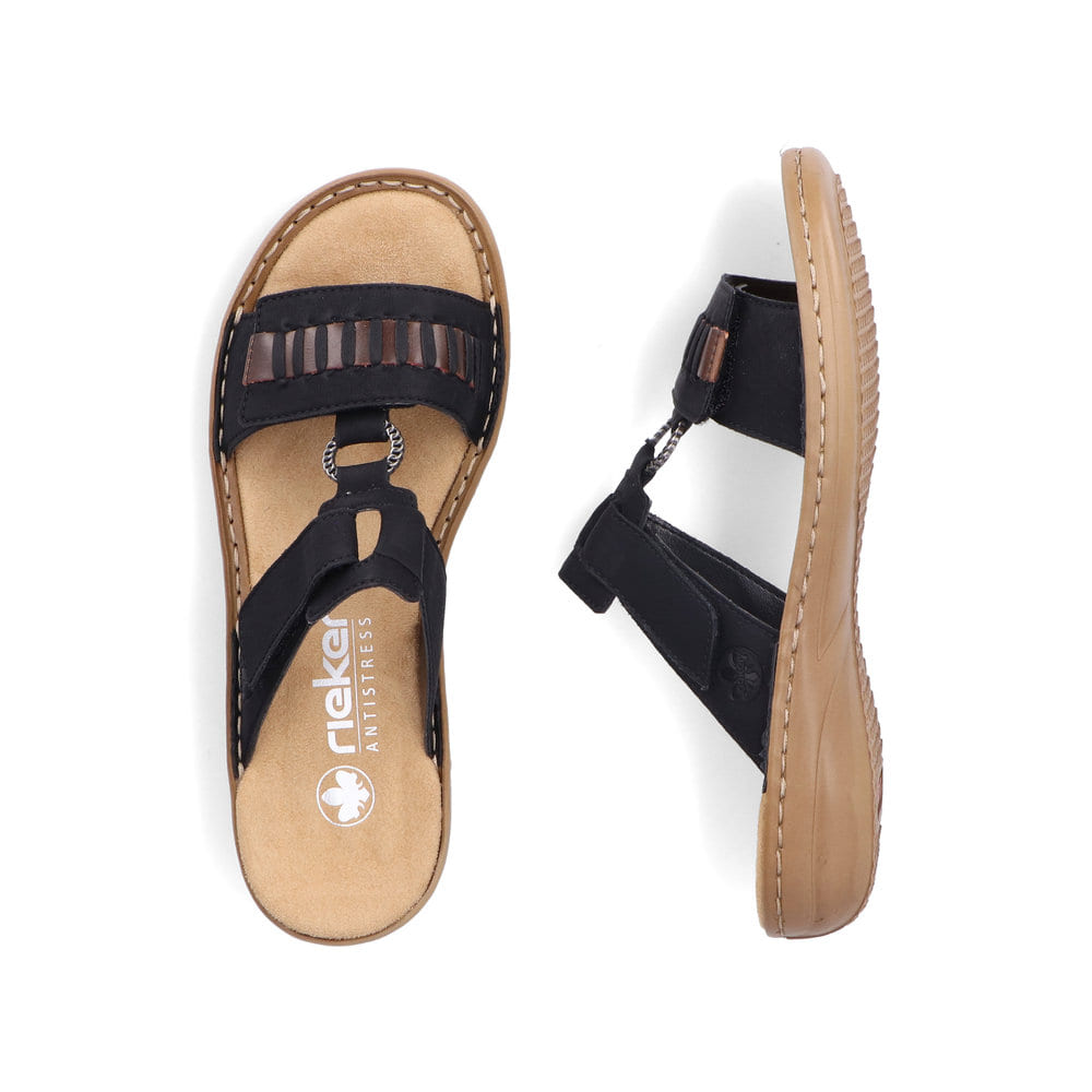 Mules Rieker noires pour femme 60881-00 avec fermeture velcro. Chaussure vue de dessus, couchée.