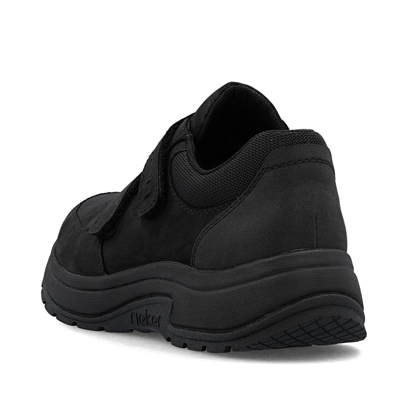 Schwarze Rieker Herren Slipper 11051-00 aus Rauleder mit einem Klettverschluss. Schuh von hinten.