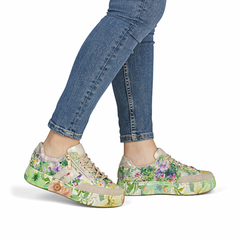 Baskets basses Rieker multicolores pour femme M7711-91 avec motif floral. Chaussure au pied.