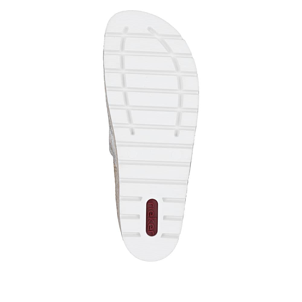 Mules Rieker dorées pour femme 69562-90 avec fleur décorative. Semelle extérieure de la chaussure.